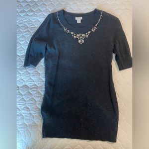 Black sweater with embellishments on collar
